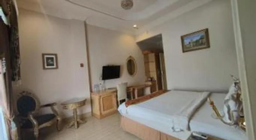 Bed in Hotel Grand Town