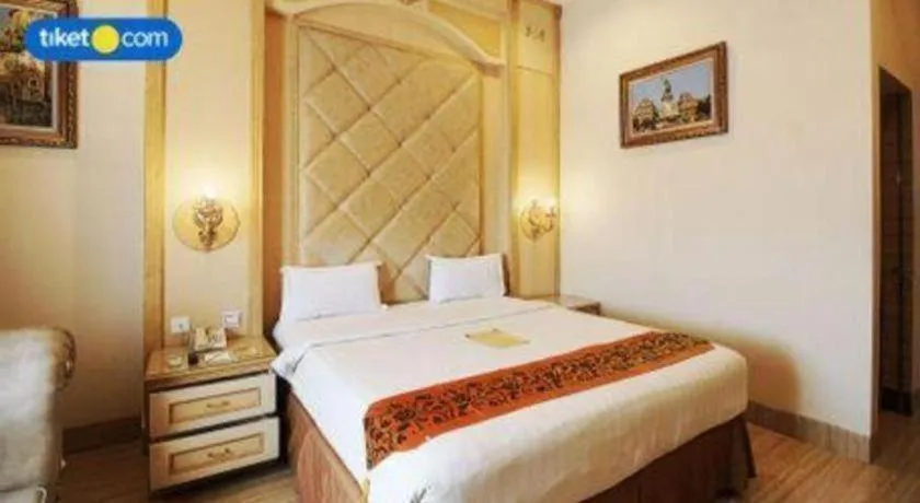 Bed in Hotel Grand Town