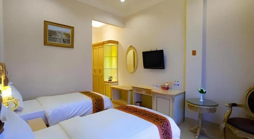 Bed in Hotel Grand Town