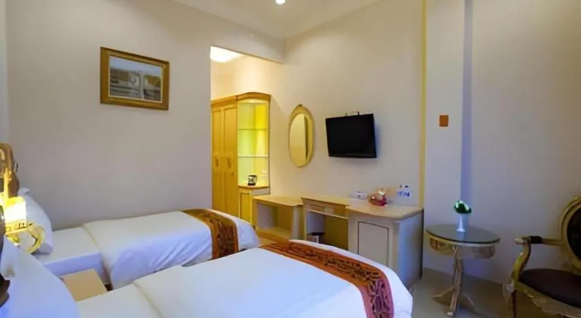 Bed in Hotel Grand Town