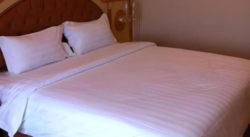 Bed in Hotel Grand Town