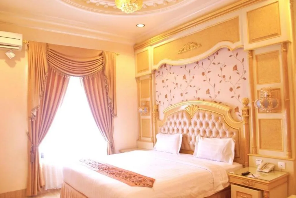 Bed in Hotel Grand Town