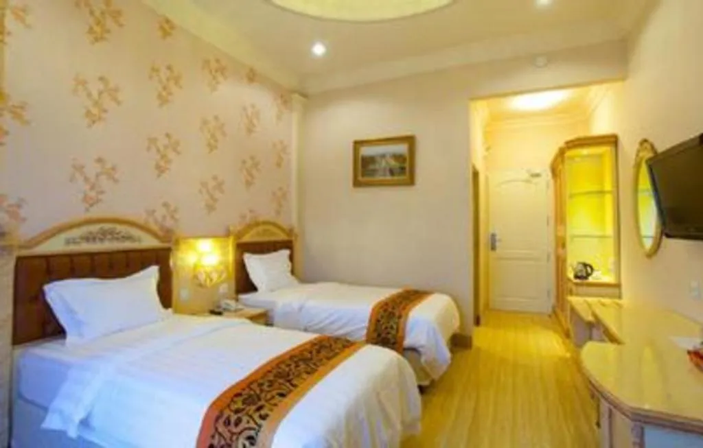 Bed in Hotel Grand Town