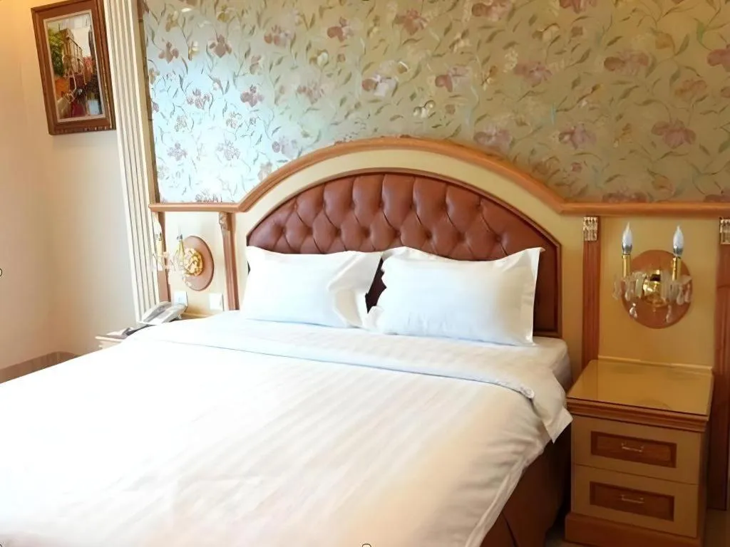 Bed in Hotel Grand Town