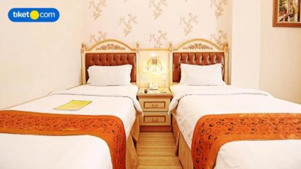 Bed in Hotel Grand Town