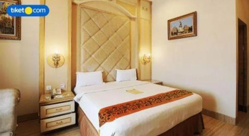 Bed in Hotel Grand Town