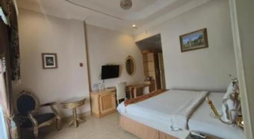 Bed in Hotel Grand Town