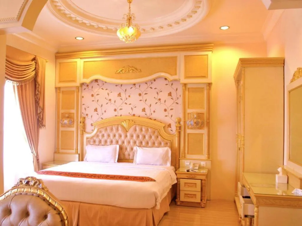 Bed in Hotel Grand Town