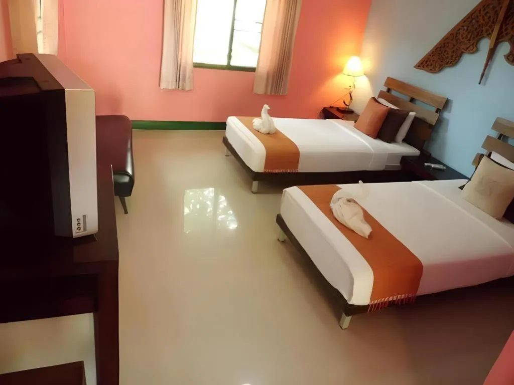 Bed in Ruen Kaew Resort