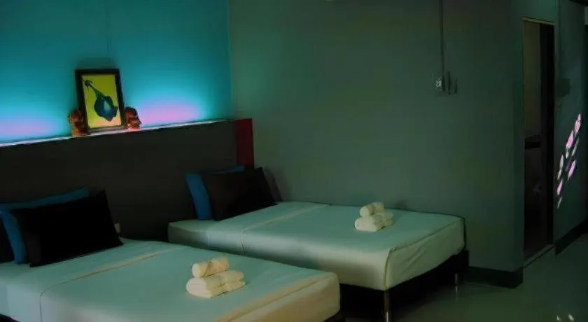 Bed in Ruen Kaew Resort