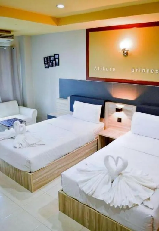 Bed in Atikarn Princess Hotel & Resort