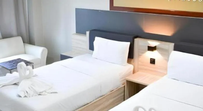 Bed in Atikarn Princess Hotel & Resort