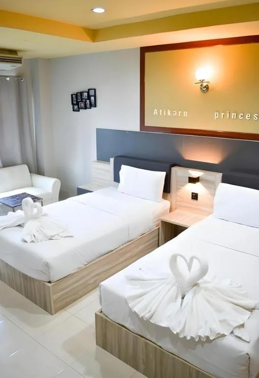 Bed in Atikarn Princess Hotel & Resort