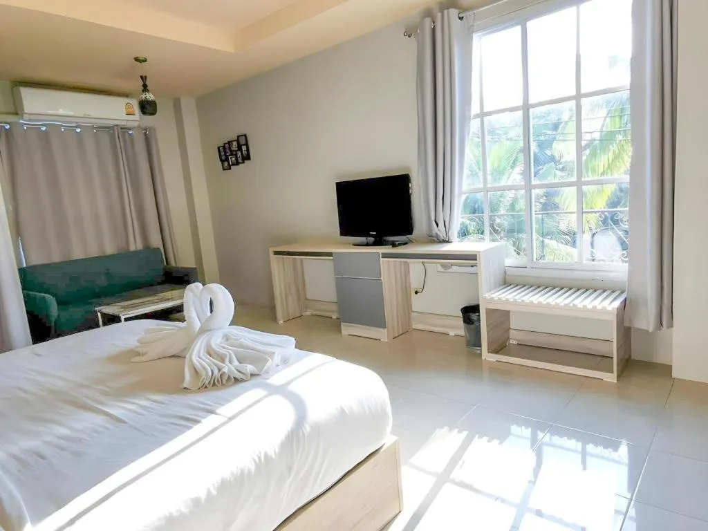 Bed in Atikarn Princess Hotel & Resort