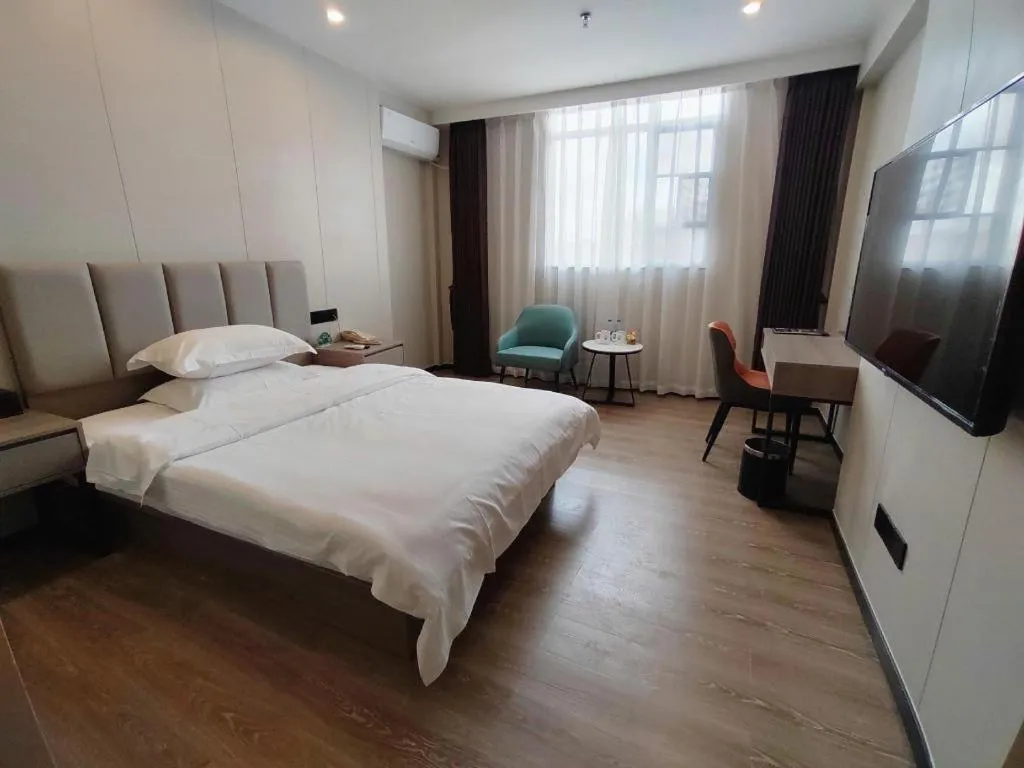 Bed in GreenTree Inn Shenzhen Kengzi Town Express Hotel