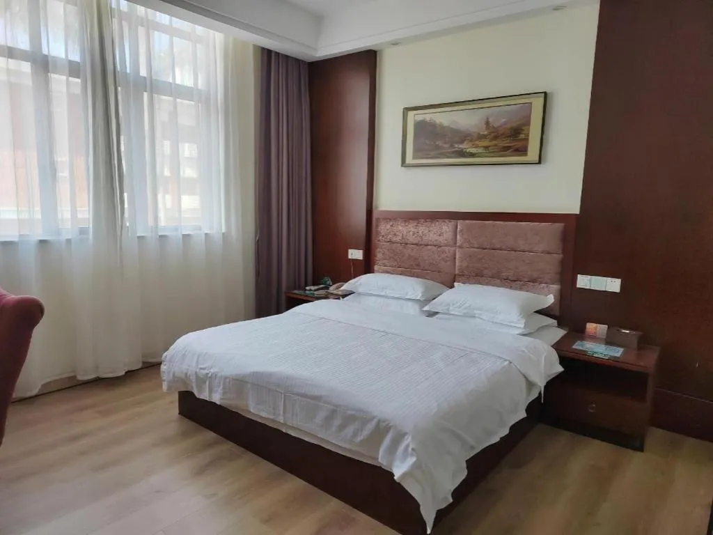 Bed in GreenTree Inn Shenzhen Kengzi Town Express Hotel