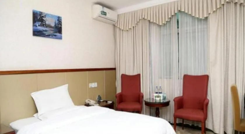 Bed in GreenTree Inn Shenzhen Kengzi Town Express Hotel