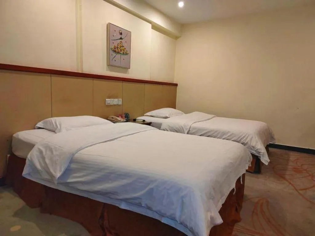 Bed in GreenTree Inn Shenzhen Kengzi Town Express Hotel