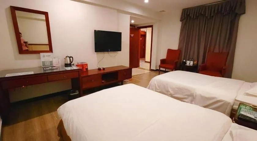 Bed in GreenTree Inn Shenzhen Kengzi Town Express Hotel