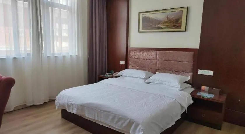 Bed in GreenTree Inn Shenzhen Kengzi Town Express Hotel