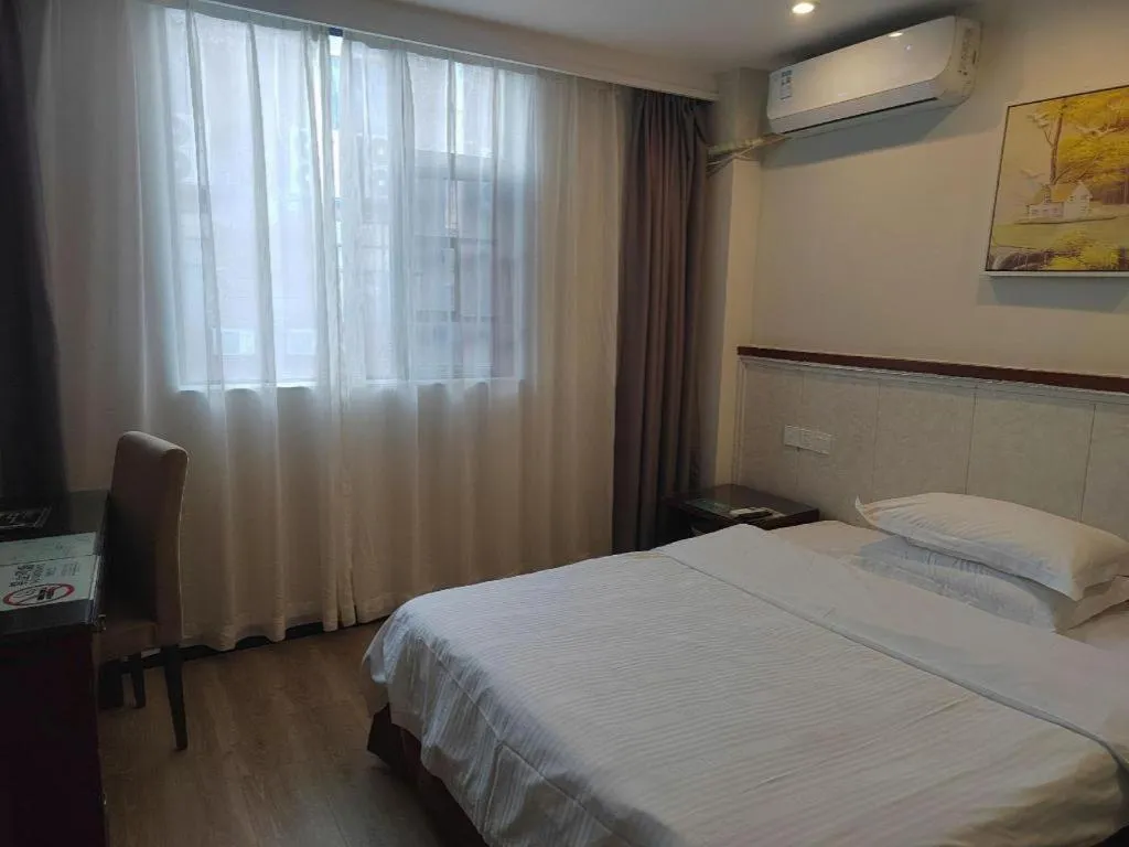 Bed in GreenTree Inn Shenzhen Kengzi Town Express Hotel