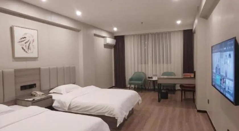 Bed in GreenTree Inn Shenzhen Kengzi Town Express Hotel