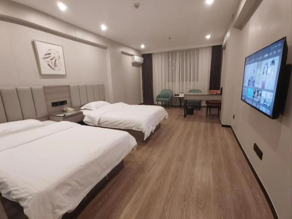 Bed in GreenTree Inn Shenzhen Kengzi Town Express Hotel