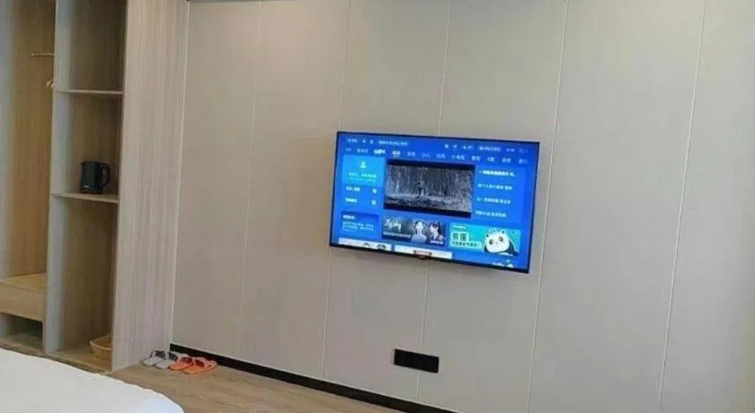 Bed in GreenTree Inn Shenzhen Kengzi Town Express Hotel