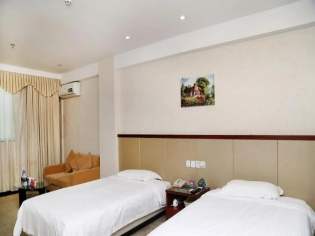 Bed in GreenTree Inn Shenzhen Kengzi Town Express Hotel
