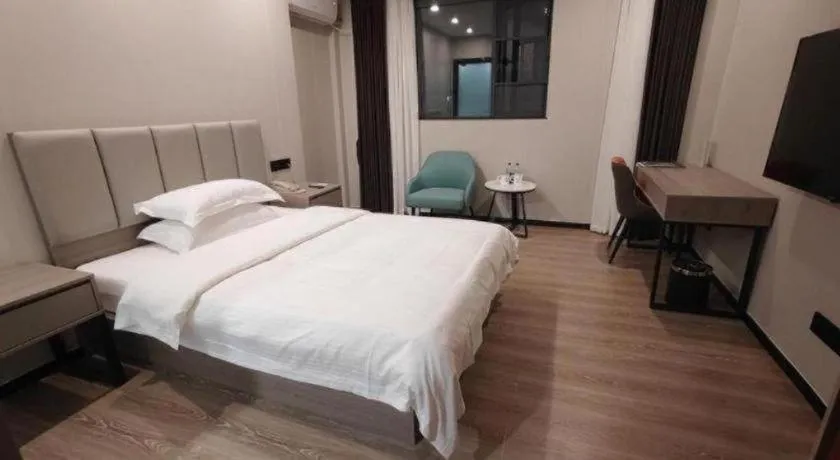 Bed in GreenTree Inn Shenzhen Kengzi Town Express Hotel