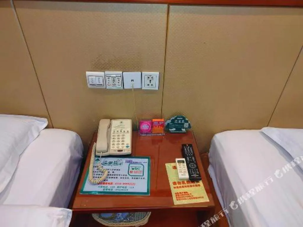 Bed in GreenTree Inn Shenzhen Kengzi Town Express Hotel