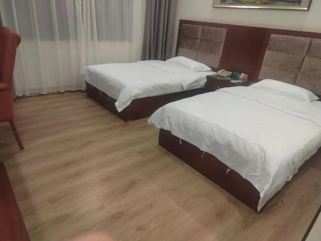 Bed in GreenTree Inn Shenzhen Kengzi Town Express Hotel