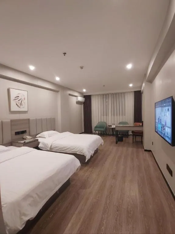 Bed in GreenTree Inn Shenzhen Kengzi Town Express Hotel