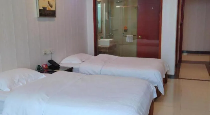 Bed in GreenTree Inn Shenzhen Kengzi Town Express Hotel