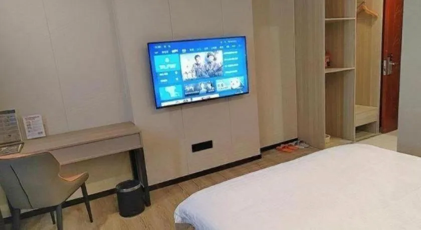 Bed in GreenTree Inn Shenzhen Kengzi Town Express Hotel