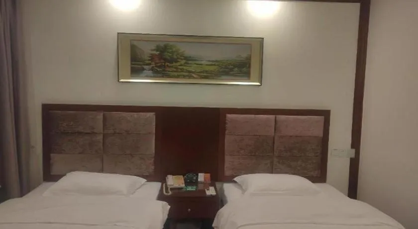 Bed in GreenTree Inn Shenzhen Kengzi Town Express Hotel