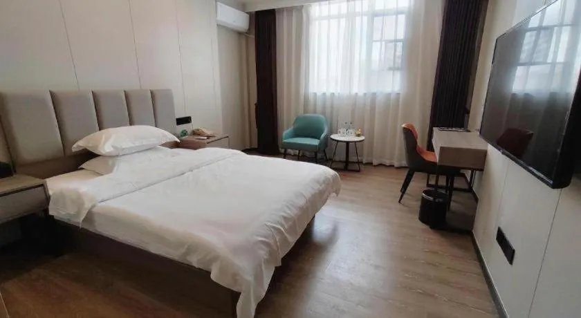 Bed in GreenTree Inn Shenzhen Kengzi Town Express Hotel