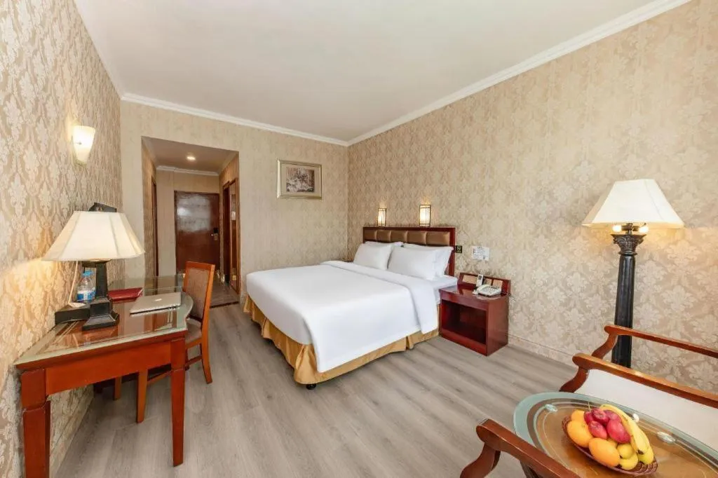 Bed in Zhenxing Hotel