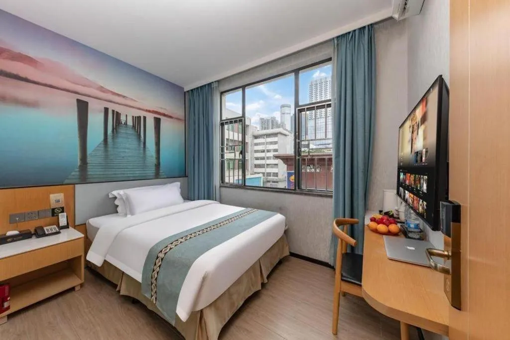 Bed in Zhenxing Hotel