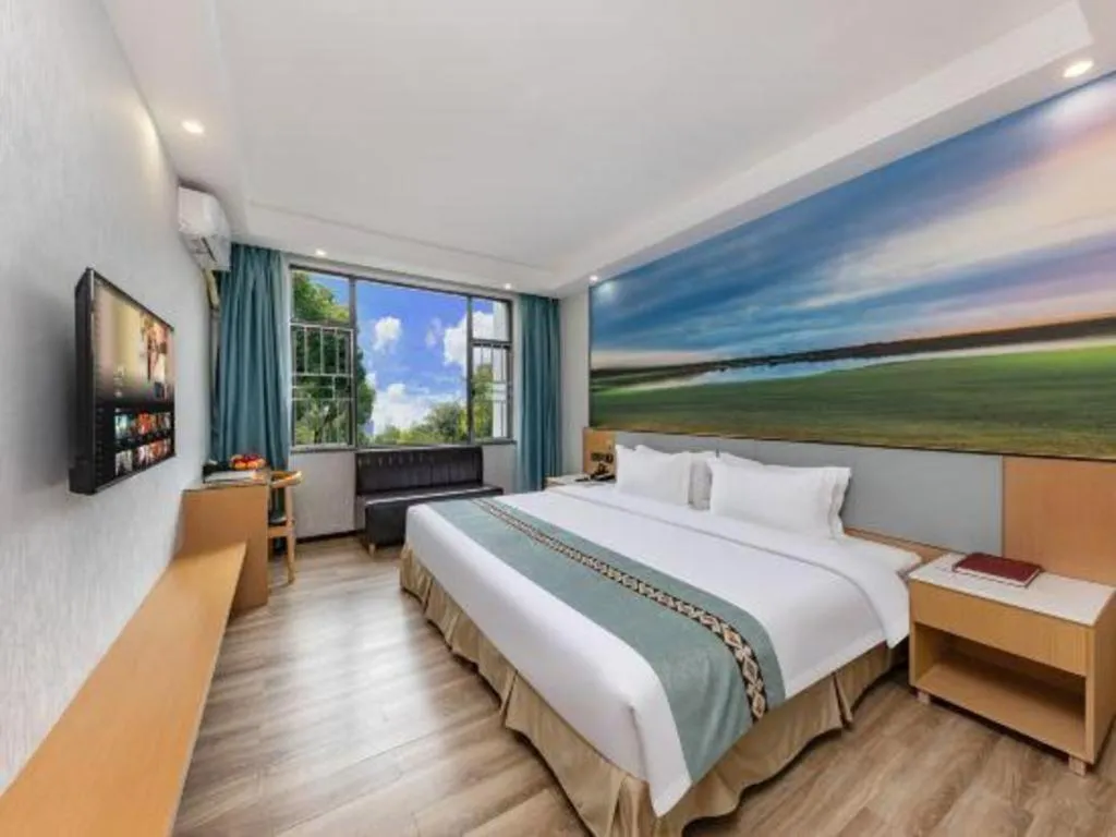 Bed in Zhenxing Hotel