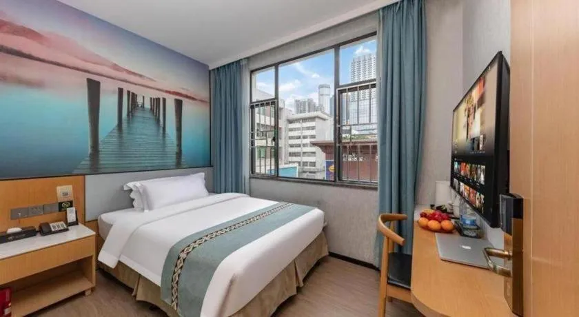 Bed in Zhenxing Hotel