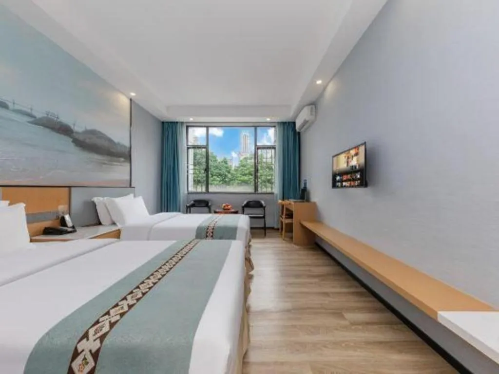 Bed in Zhenxing Hotel