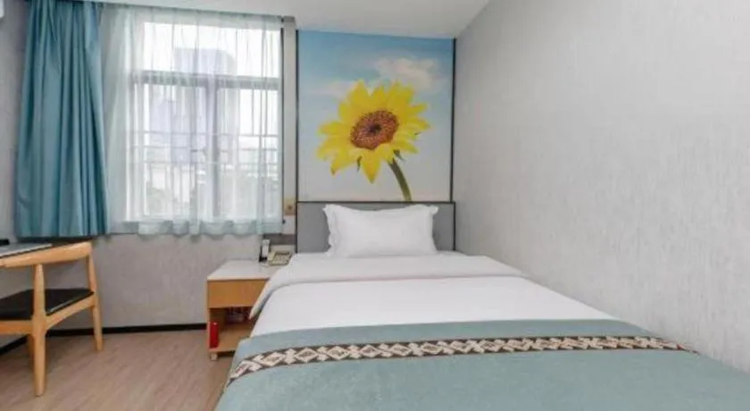 Bed in Zhenxing Hotel