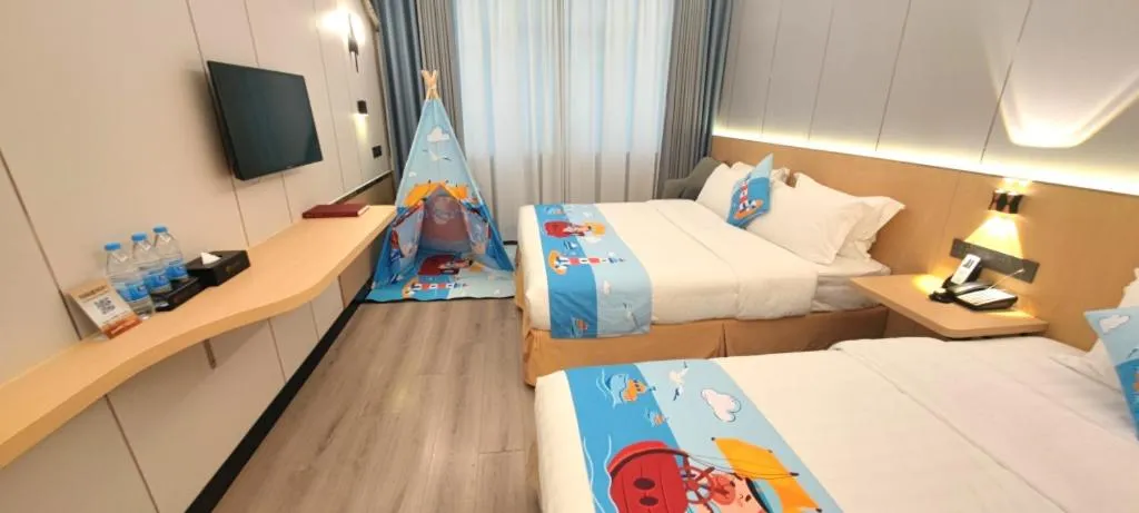 Bed in Zhenxing Hotel