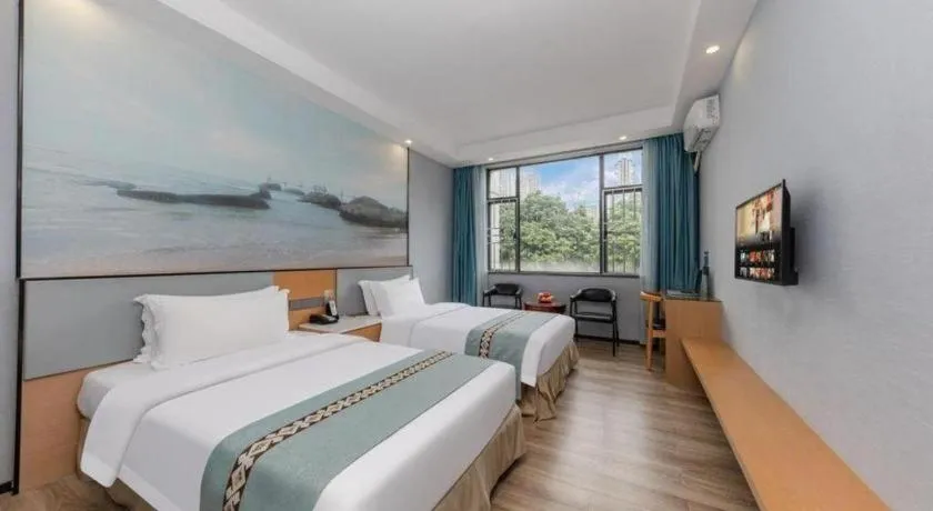 Bed in Zhenxing Hotel