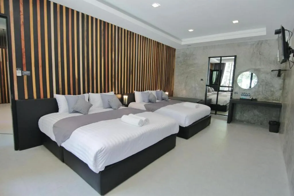 Bed in Baan Chao Mai Beach House