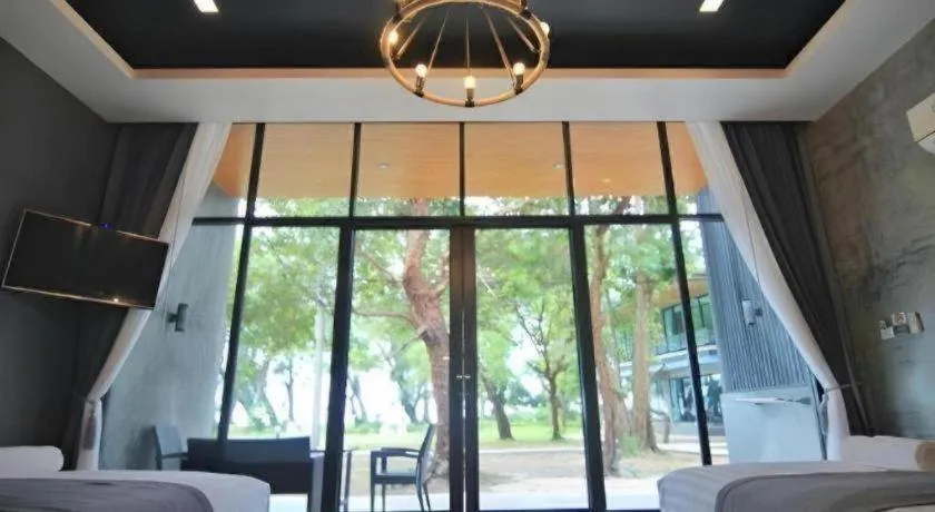 Bed in Baan Chao Mai Beach House