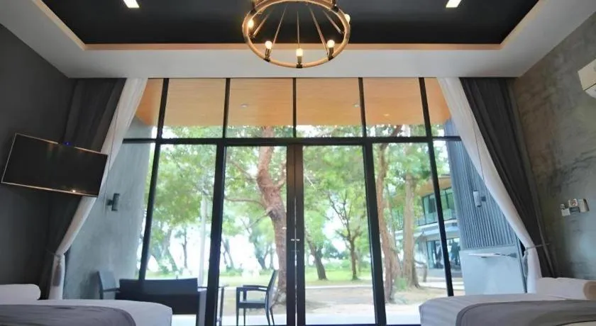 Bed in Baan Chao Mai Beach House