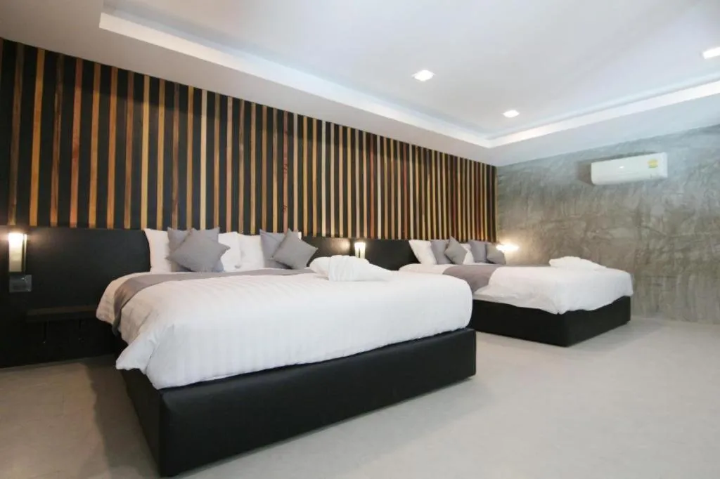 Bed in Baan Chao Mai Beach House