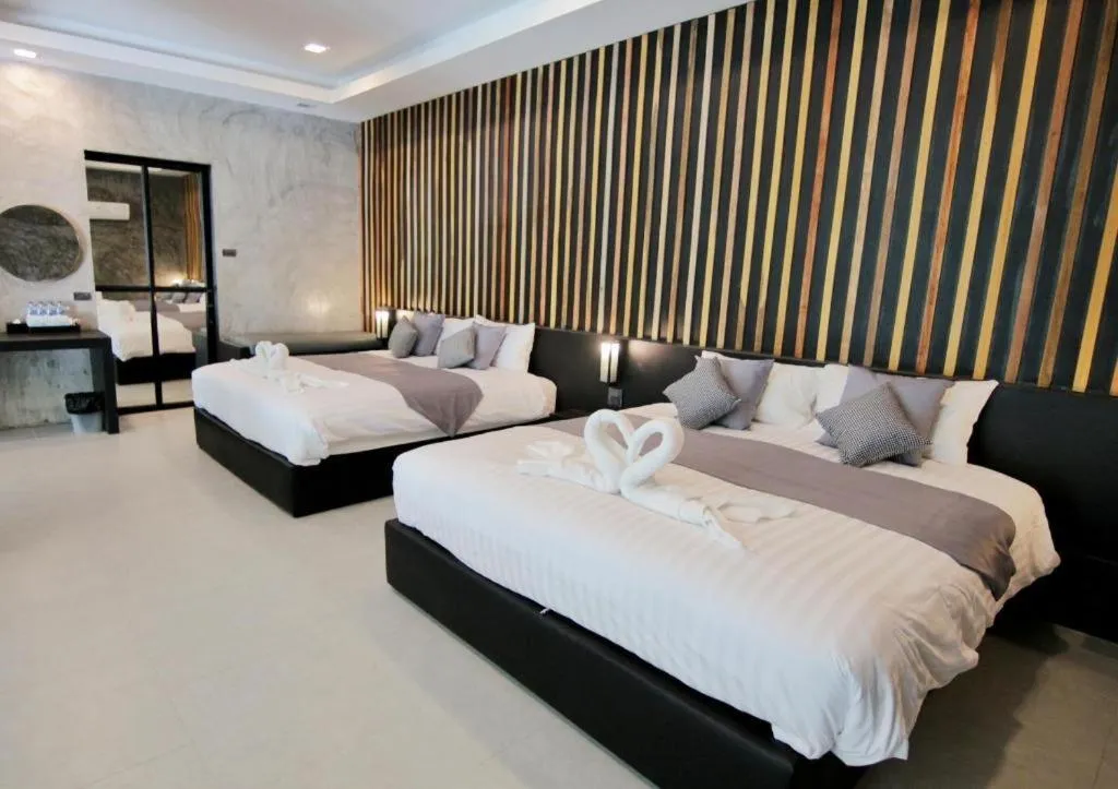 Bed in Baan Chao Mai Beach House